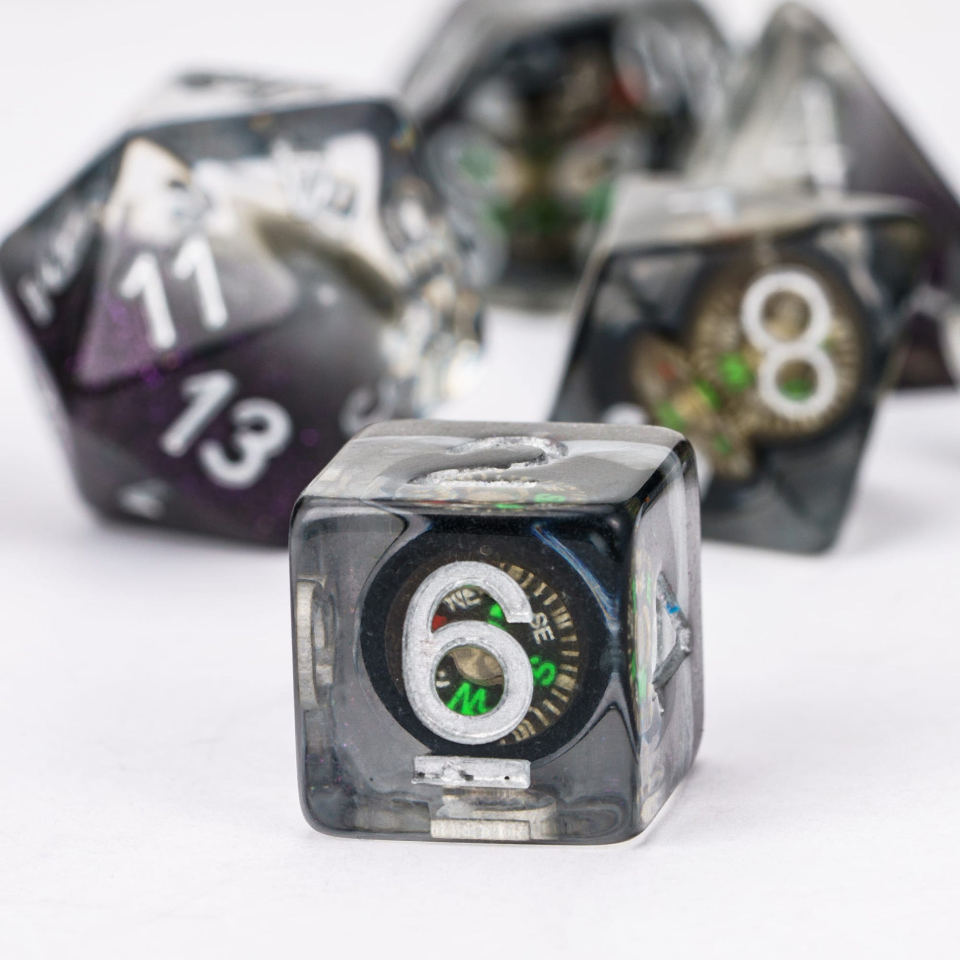 D6 Compass Core Dice, black resin with compass inside and silver numbering for RPG and DND 5e campaigns
