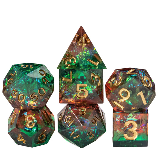 Stacked Constellations Essence sharp edge dice set with iridescent green resin and gold numbers for DnD