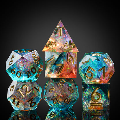 Constellations Essence sharp edge dice set stacked for display, multicolor resin with gold numbers