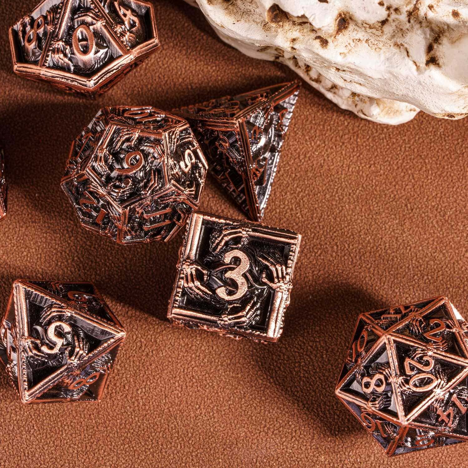Copper Relic Metal Dice Set focus on twenty-sided die