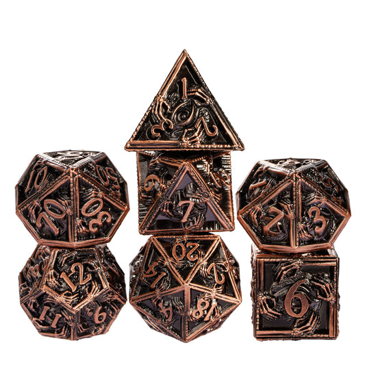 Copper Relic Metal Dice Set stacked with copper and black RPG dice