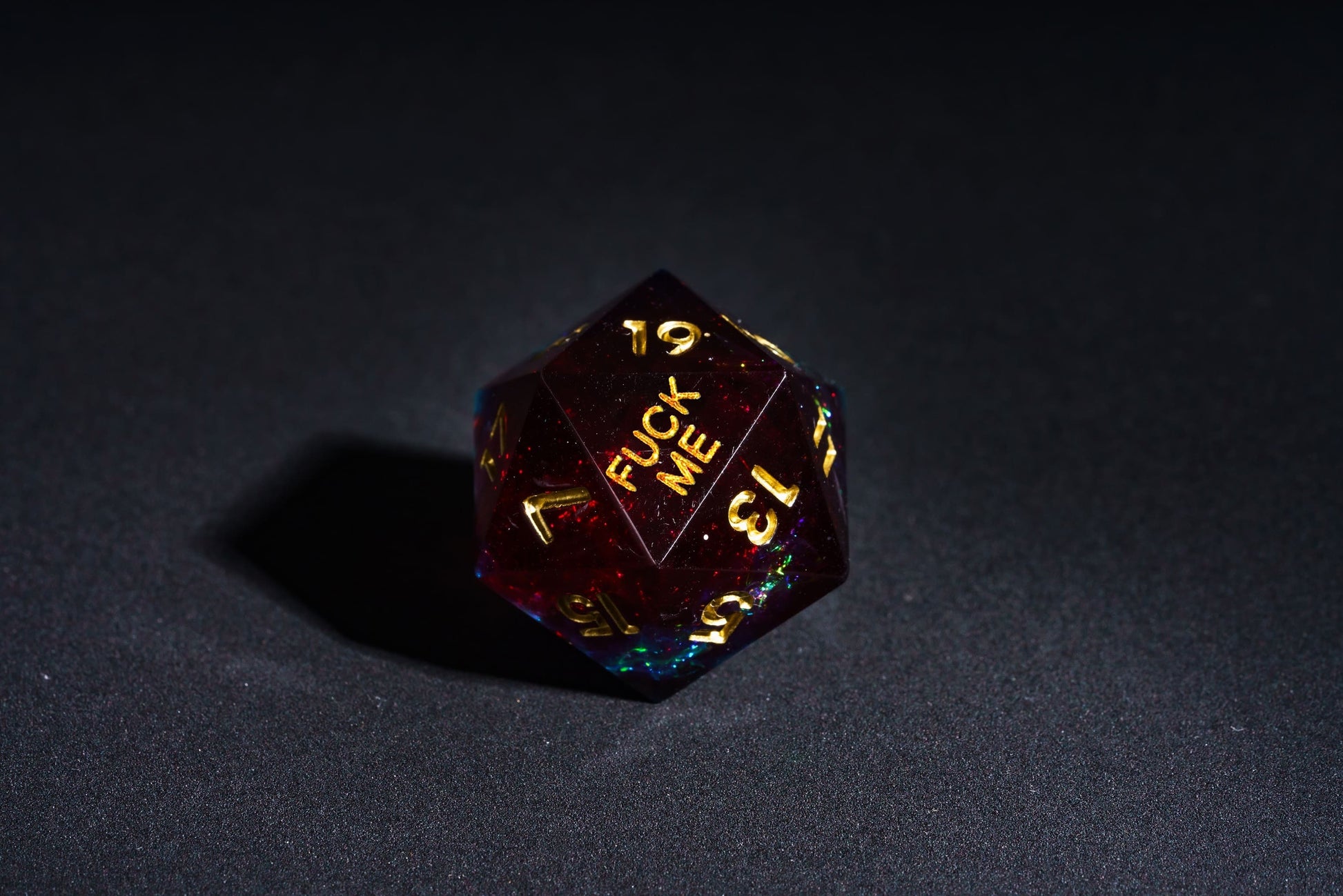 Corrupted Cobalt F*ck you Sharp Edge D20 closeup with gold numbers and deep blue-red resin