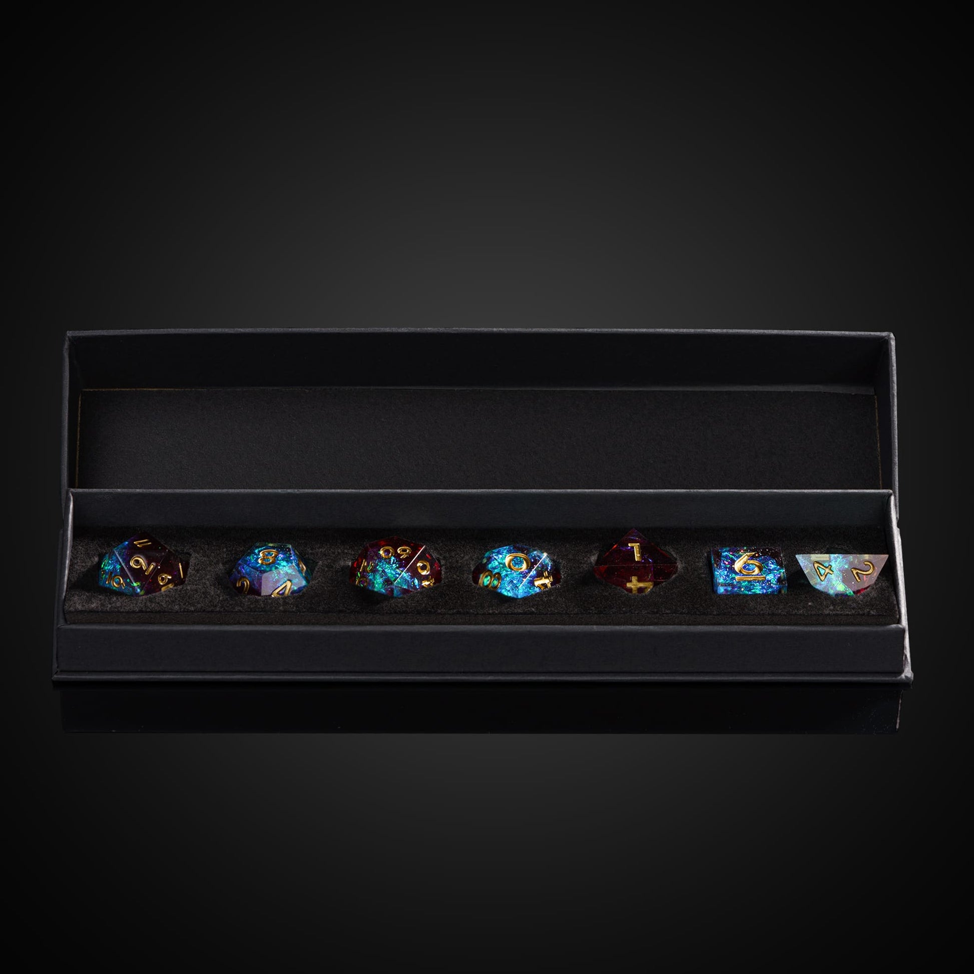 Open Only Crits black dice case displaying Corrupted Cobalt sharp edge polyhedral set