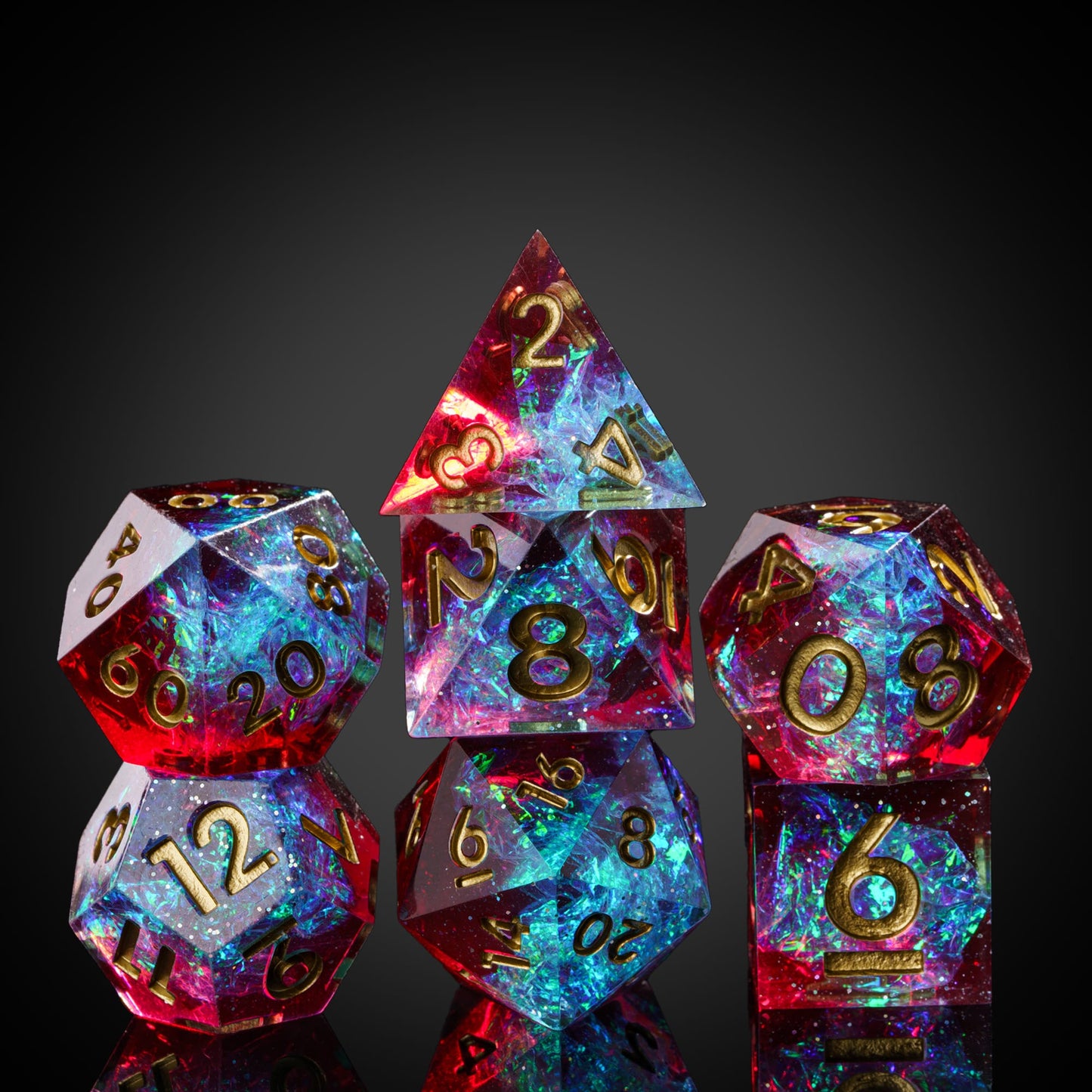 Corrupted Cobalt sharp edge dice set stacked with shimmering red and blue resin