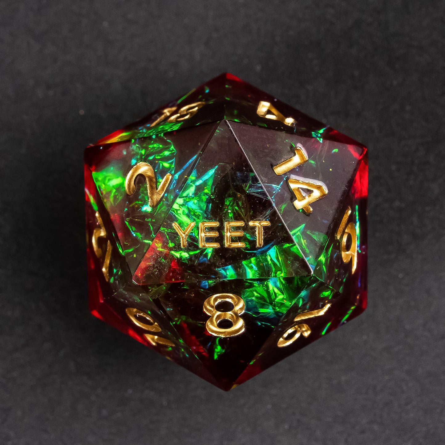 Close-up of the Corrupted Meadow Yeet sharp edge D20 with gold numbers and holographic shimmer