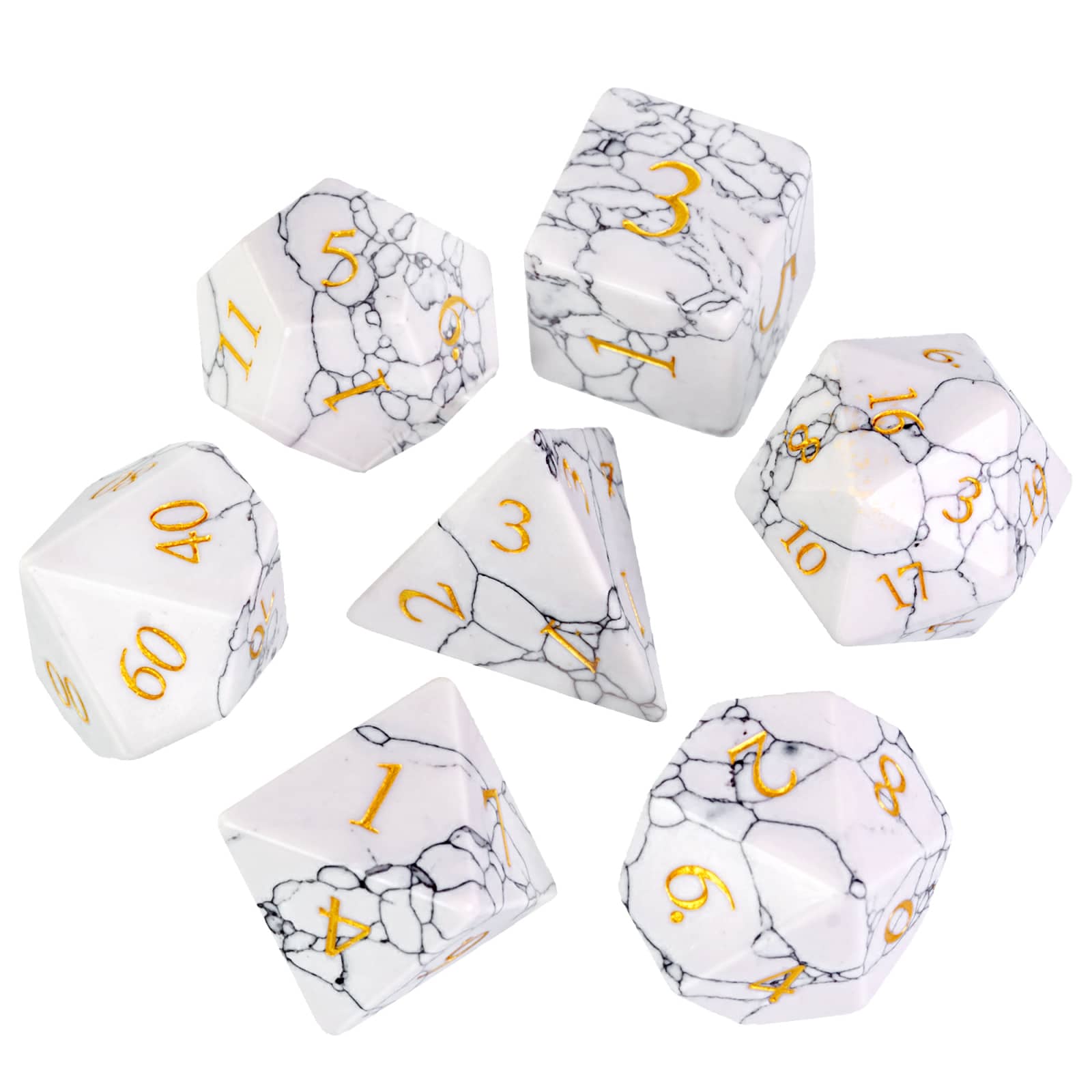 Flat lay of Cracked Marble Stone Dice Set showing seven dice with black veining and gold numbers