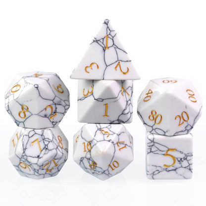 Front view of Cracked Marble Stone Dice Set with white marble texture and gold numbering
