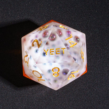 Close up of Crisp Brew Sharp Edge D20 with YEET face for DnD dice