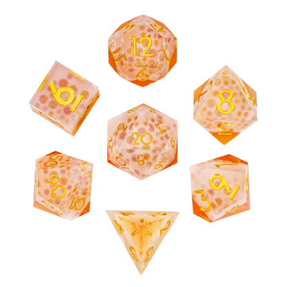 Flat lay of Crisp Brew Sharp Edge Dice Set 7 piece resin dice collection for DnD and DnD 5e
