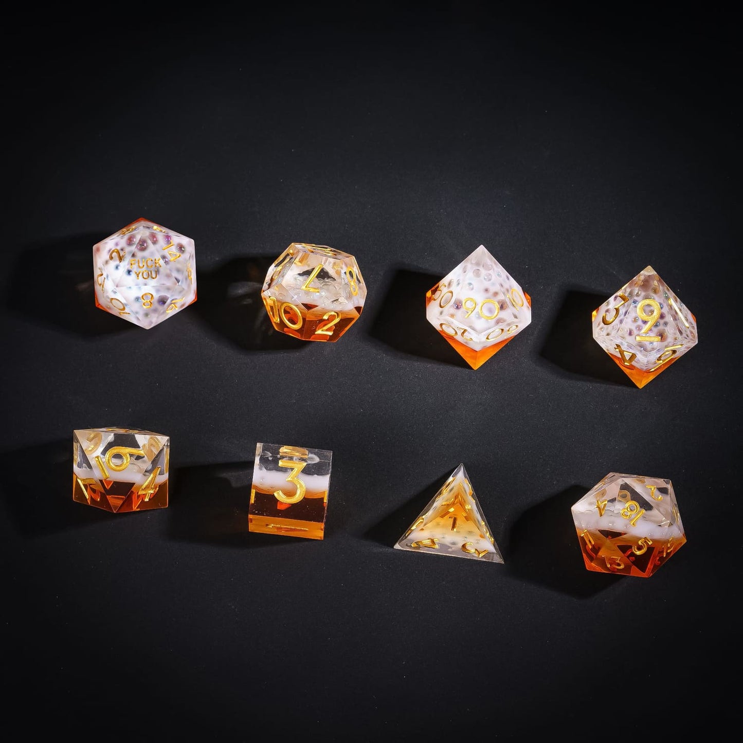Flat lay of Crisp Brew Sharp Edge Dice Set 8 piece resin dice for DnD