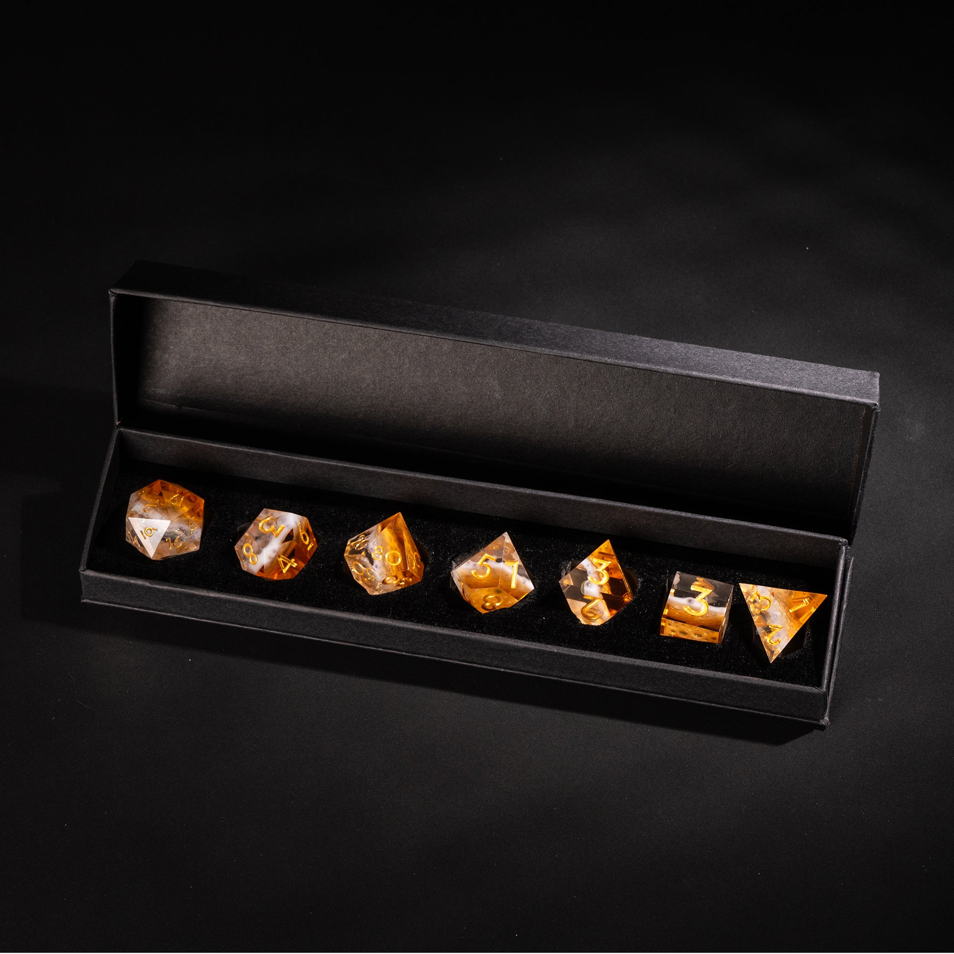 Crisp Brew Sharp Edge Dice Set displayed in black presentation box for tabletop RPGs