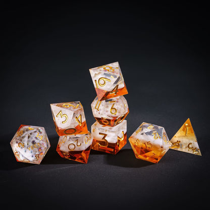 Stacked display of Crisp Brew Sharp Yeet Edge Dice Set for DnD collectors