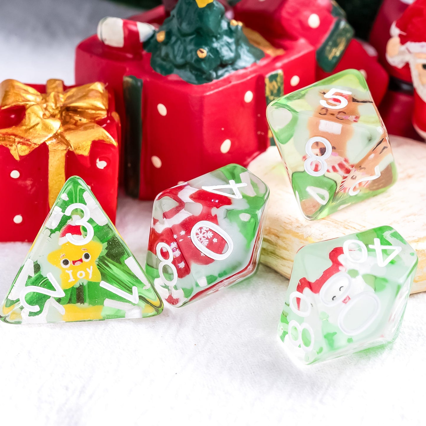 Critmas Crew Dice Set with Santa and gift decorations for festive holiday themed DnD games