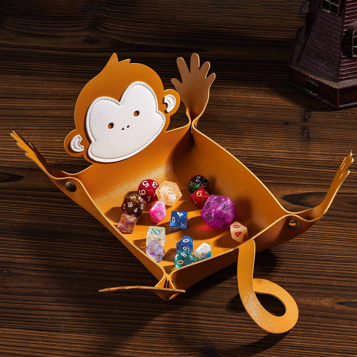 Monkey Critter Dice Tray holding polyhedral dice for DnD & DnD 5e tabletop play