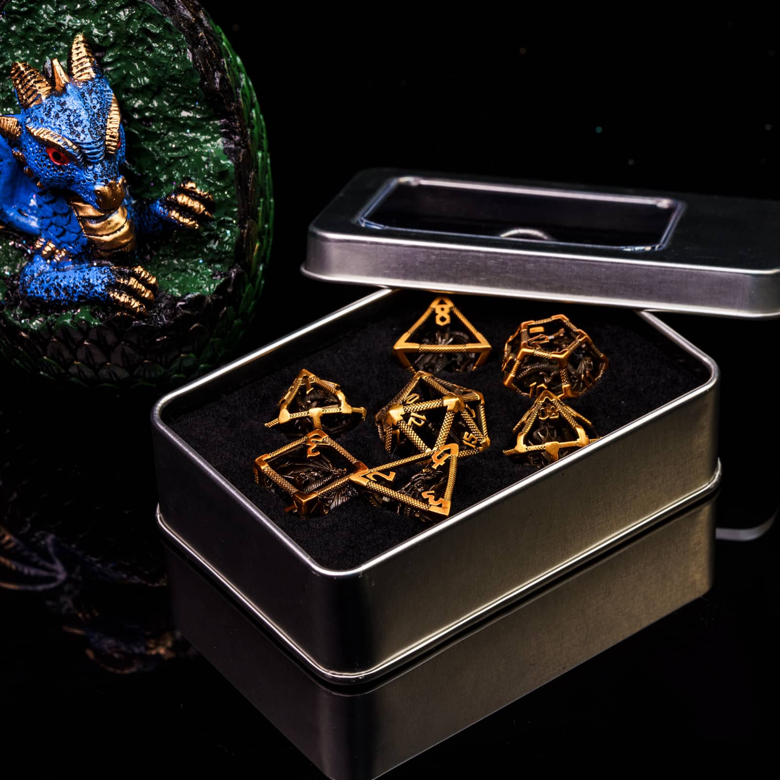 Drake's Nest Hollow Metal Dice Set in Ancient Gold, 7 piece DnD dice in display box with dragon egg