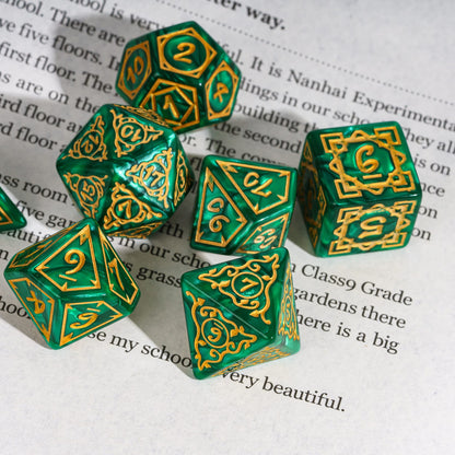 Green & gold Druidic Life Dice Set, 7 piece polyhedral dice on text background