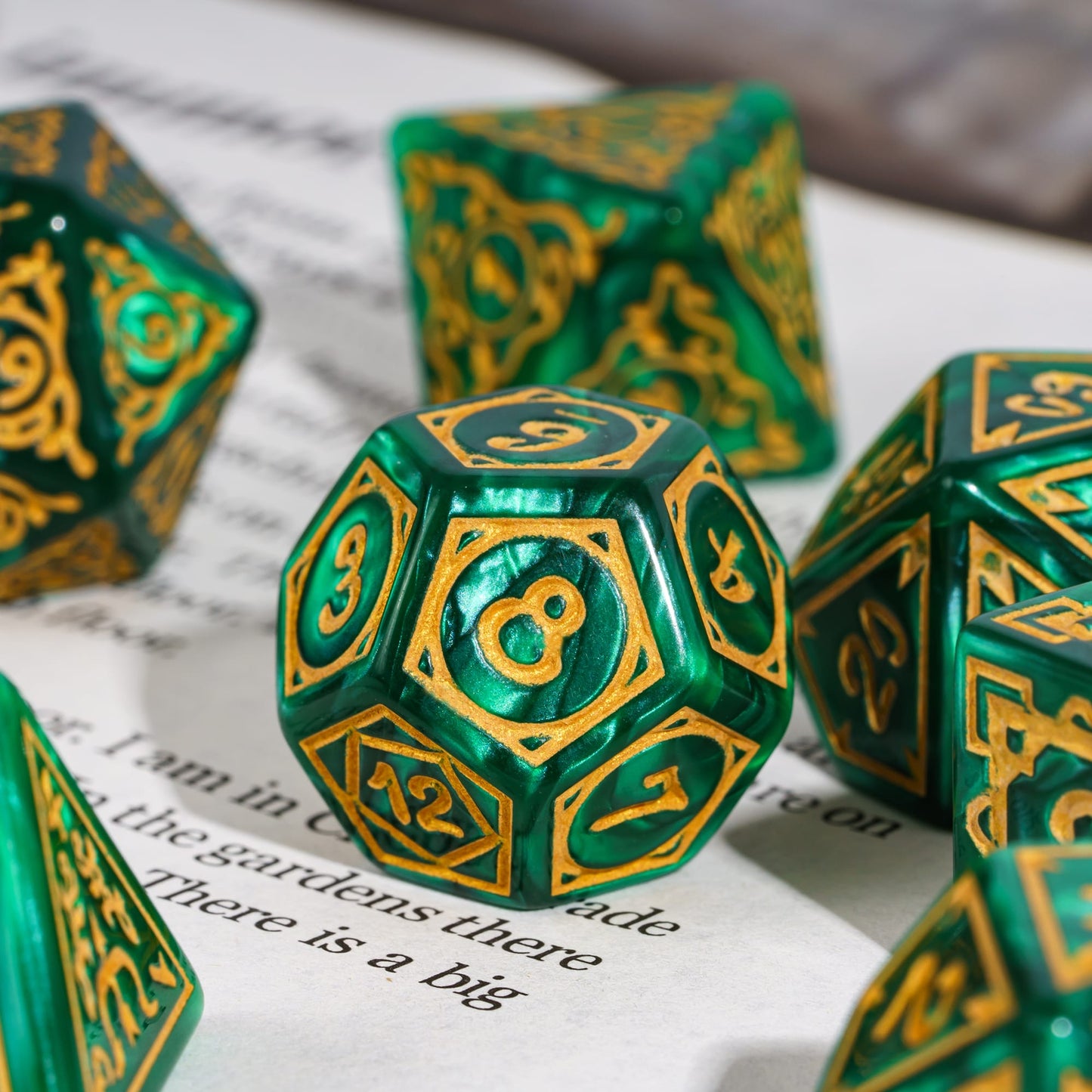 Detailed close-up of D20 die from green & gold Druidic Life Dice Set
