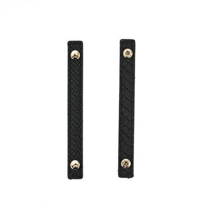 Removable black straps for the Dungeon Master Dice Tray & Case, used to secure the dice storage tube
