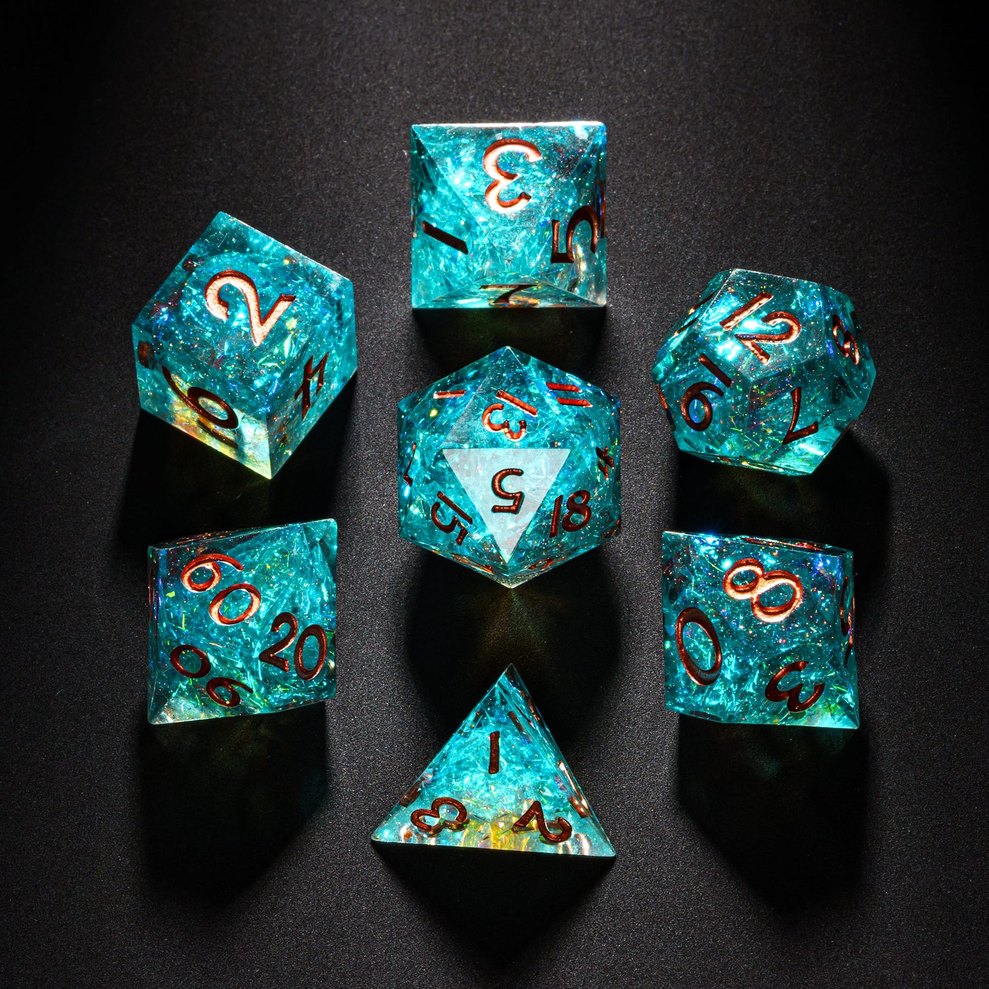 Full 7-piece Echoes of Atlantis Sharp Edge Dice Set neatly displayed, perfect for DnD & DnD 5e.