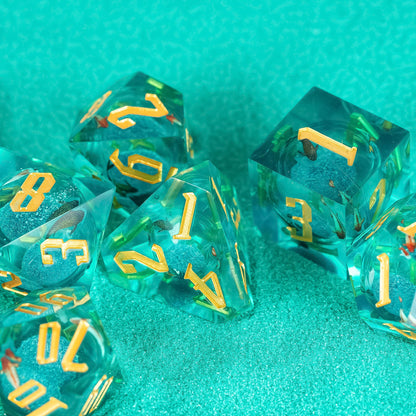 Top view of Celestial Reef sharp edge dice arranged on teal textured surface