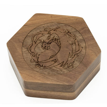 Top view of Embercoil Vault sapelli dice case featuring detailed dragon engraving