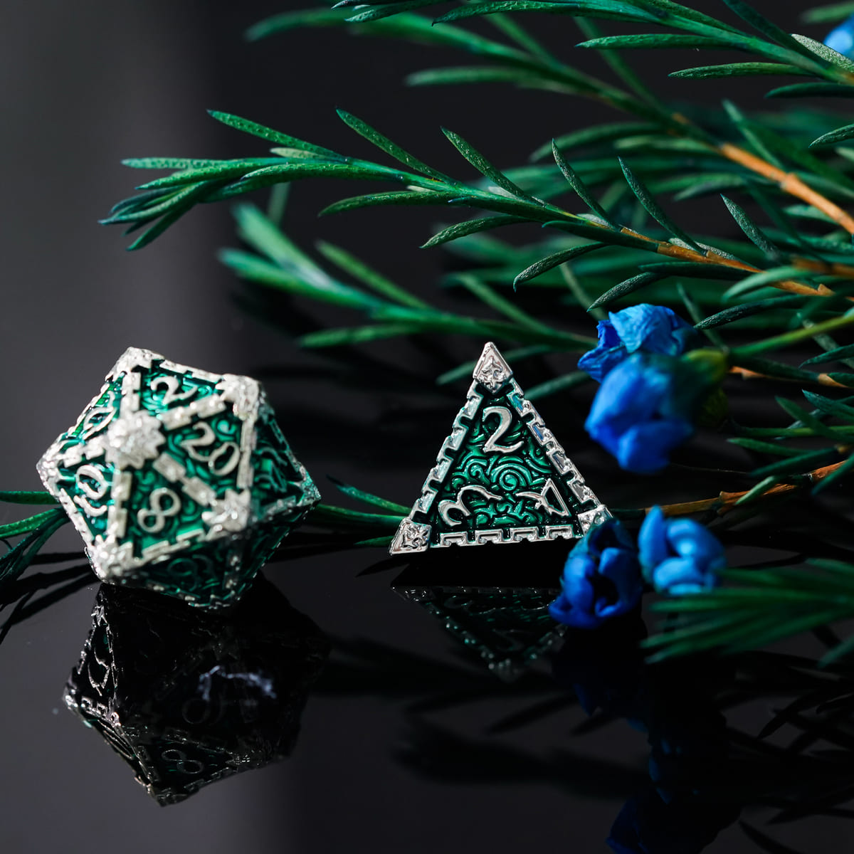 Emerald Blade metal dagger D20 and D4 dice with floral design accents for DnD and tabletop RPGs