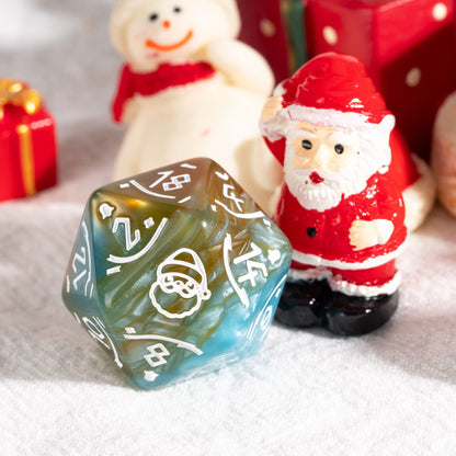 Close up of brown and blue Festive Fate D20 with Santa engraving for Christmas themed tabletop RPG play