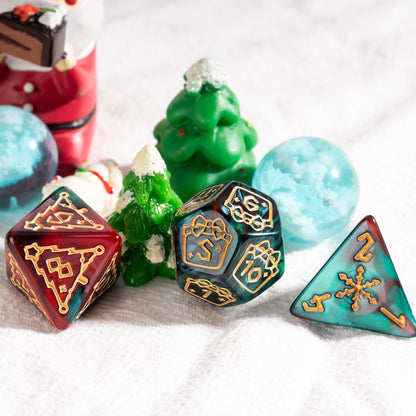 Red and green Festive Fate Christmas DnD dice set with gold designs displayed with holiday decorations
