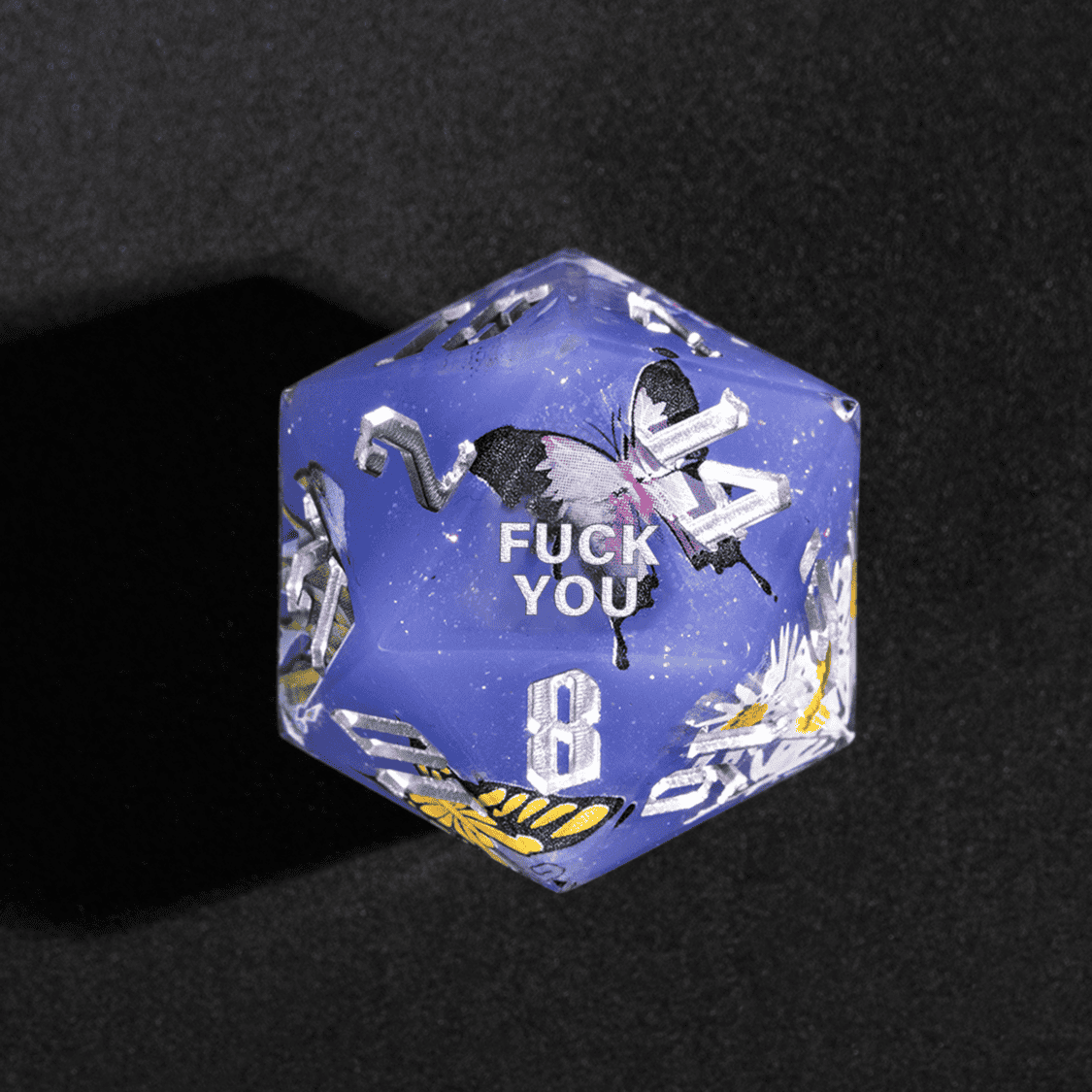 Close up of Floral Eclipse Fuck You D20 with butterfly art for DnD players