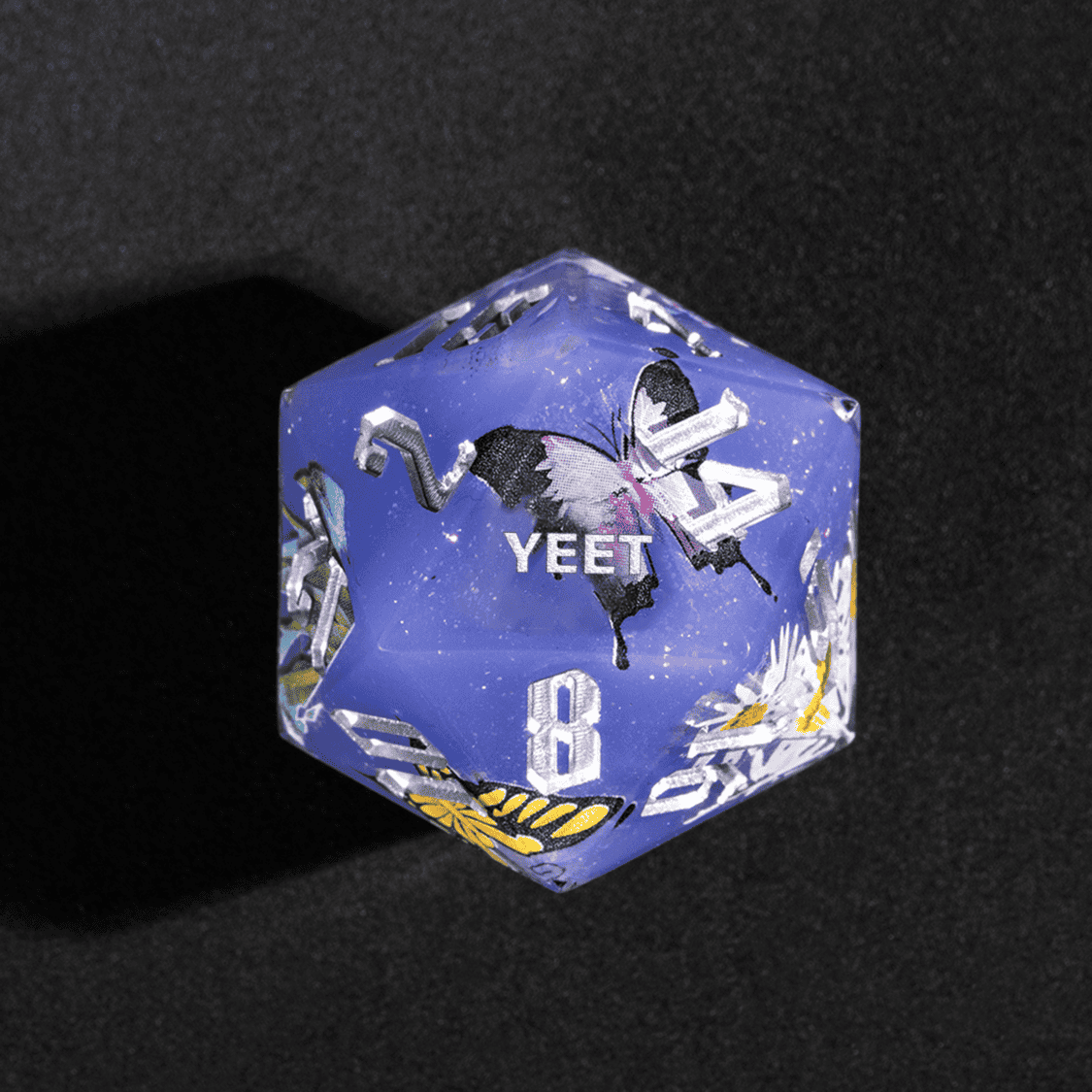 Close up of Floral Eclipse Yeet D20 with butterfly and flower artwork