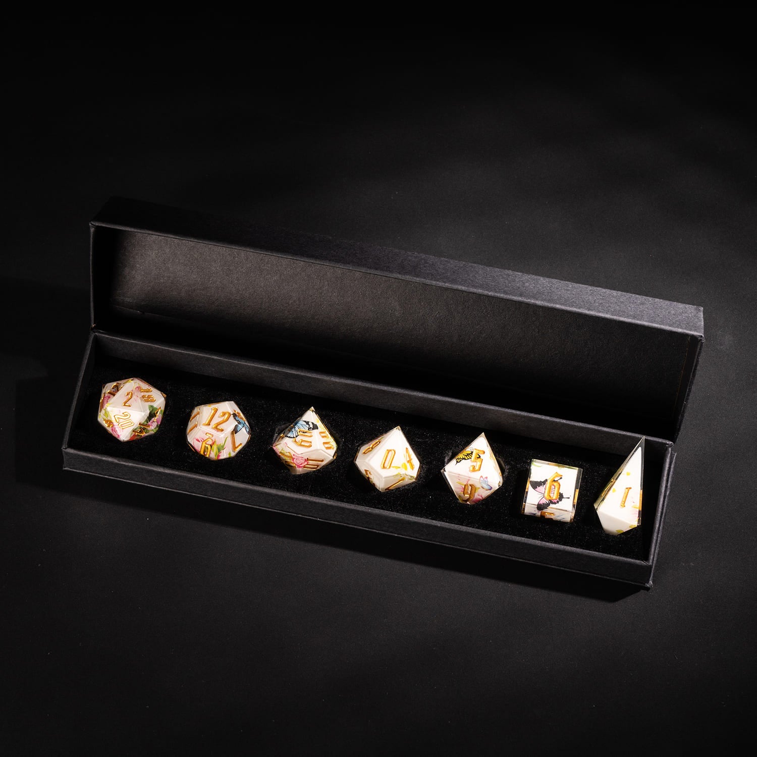 Floral Radiance Sharp Edge Dice Set in black storage box 7 piece ivory resin dice for DnD and tabletop RPG