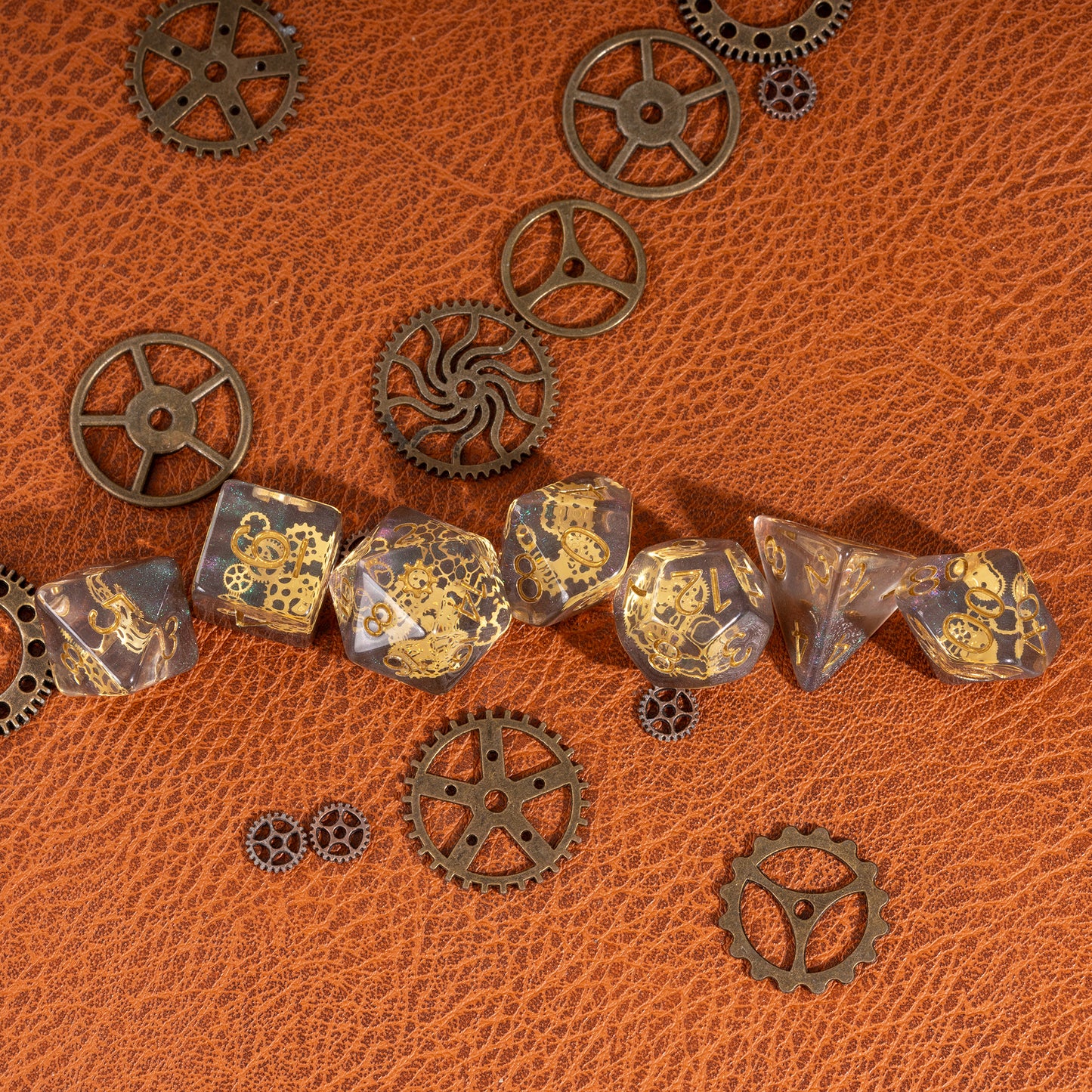 Flux Gearshift Dice Set displayed in a horizontal arrangement with steampunk gear accents on a textured leather surface