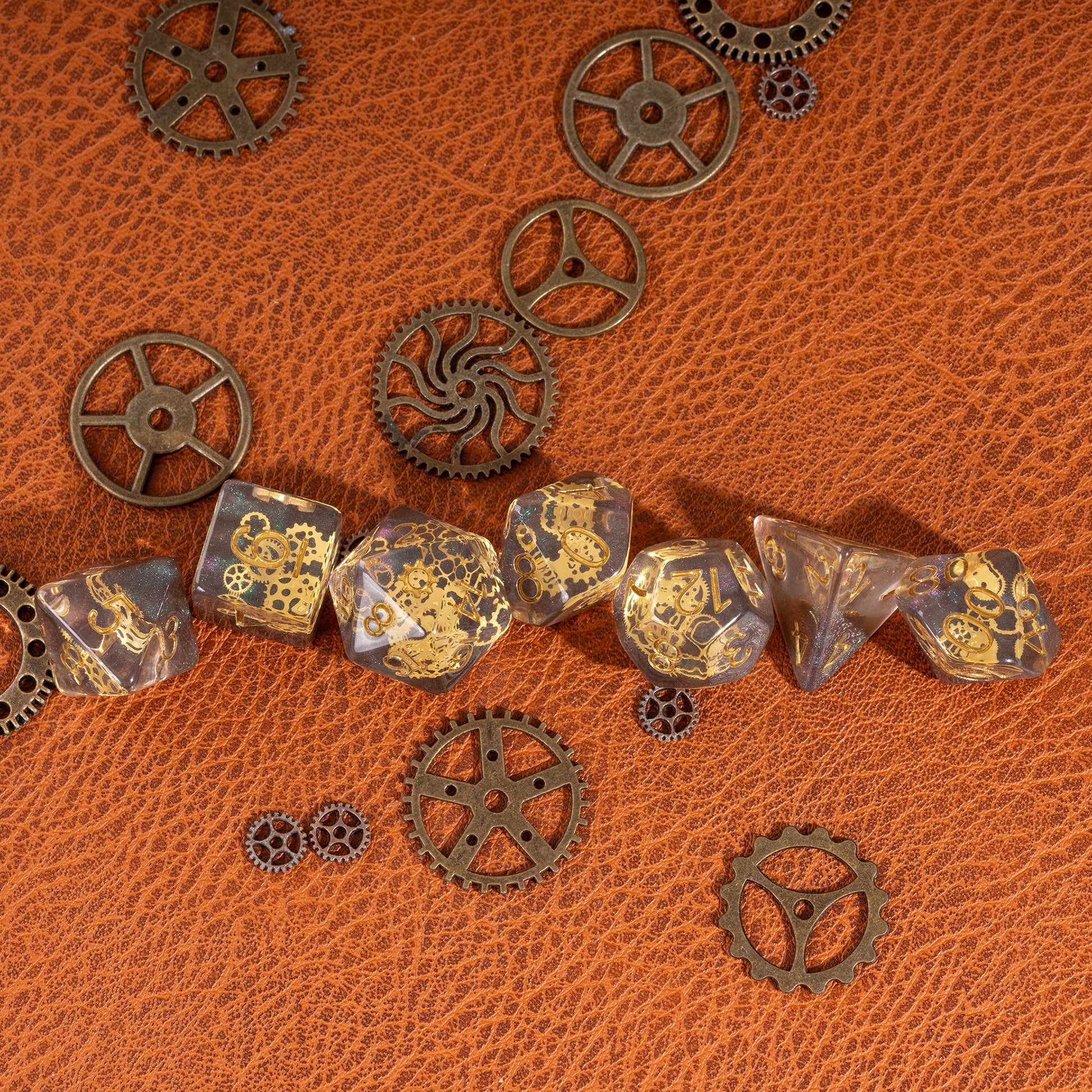 Flux Gearshift Dice Set displayed in a horizontal arrangement with steampunk gear accents on a textured leather surface