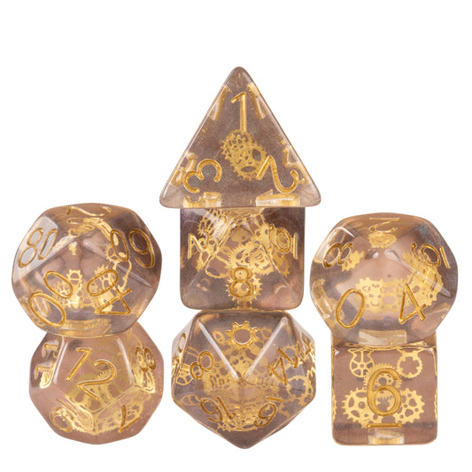 Flux Gearshift Dice Set stacked display featuring translucent resin dice with embedded golden gears and gold numbering