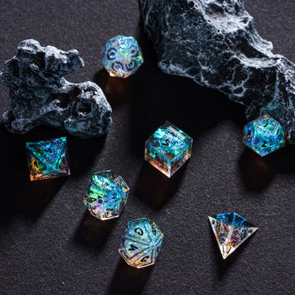 Fortuna's Legacy holographic sharp edge polyhedral dice set, resin 7 piece dice on rock display