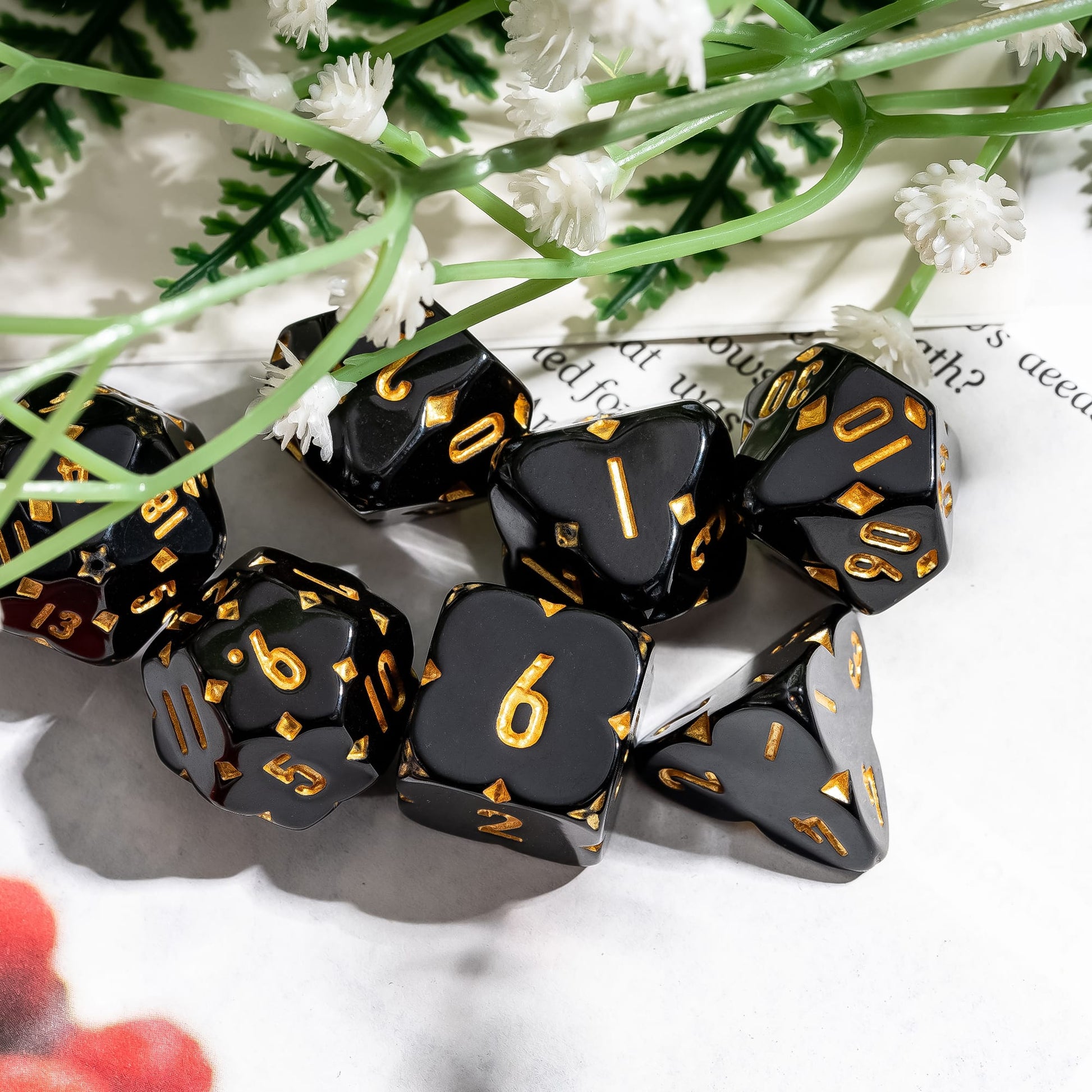 Black Fourfold Clover polyhedral dice set for DnD & DnD 5e, gold numbering and clover motif design