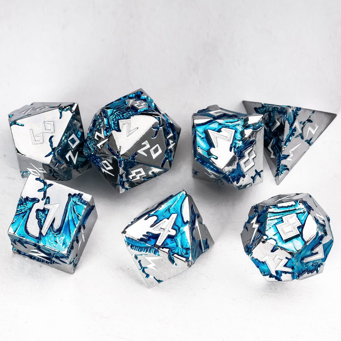 Complete Frost Tide Dragon metal dice set with silver metal and blue tide effects