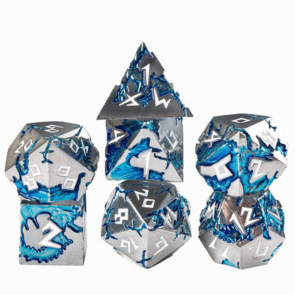 Stacked Frost Tide Dragon metal dice set with silver finish and blue wave accents