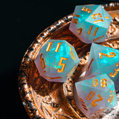 Frosted Mirage Sharp Edge Dice Set displayed on ornate tray with frosted resin & gold numbers