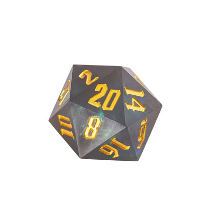 Frosted Mirage sharp edge D20 in smoky grey resin with green shimmer and gold numbers