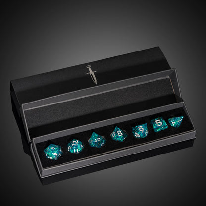 Icy Shard dice set displayed in black case for DnD and tabletop RPG, teal resin with silver numbering