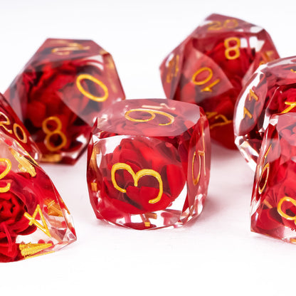 Infernal Lotus Sharp Edge Dice Set D6 close-up featuring a suspended crimson lotus flower and gold numbering