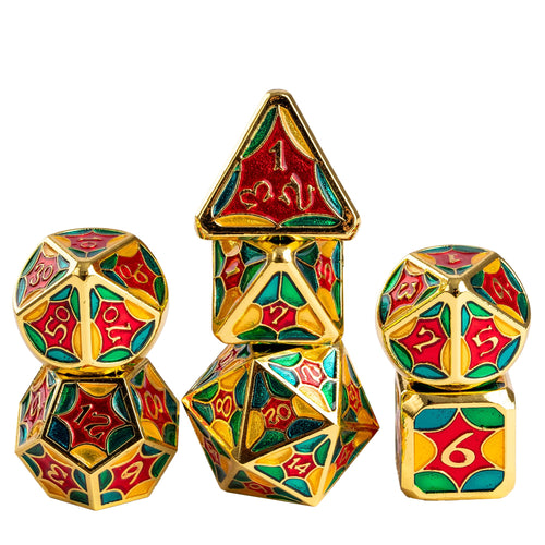 Jester Chroma metal dice set with gold frames and vibrant red, green, blue, and yellow stained glass style panels