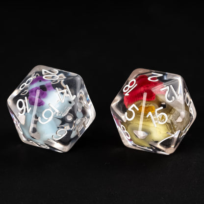 Kobold and Gator single D20 resin dice shown side by side in clear resin