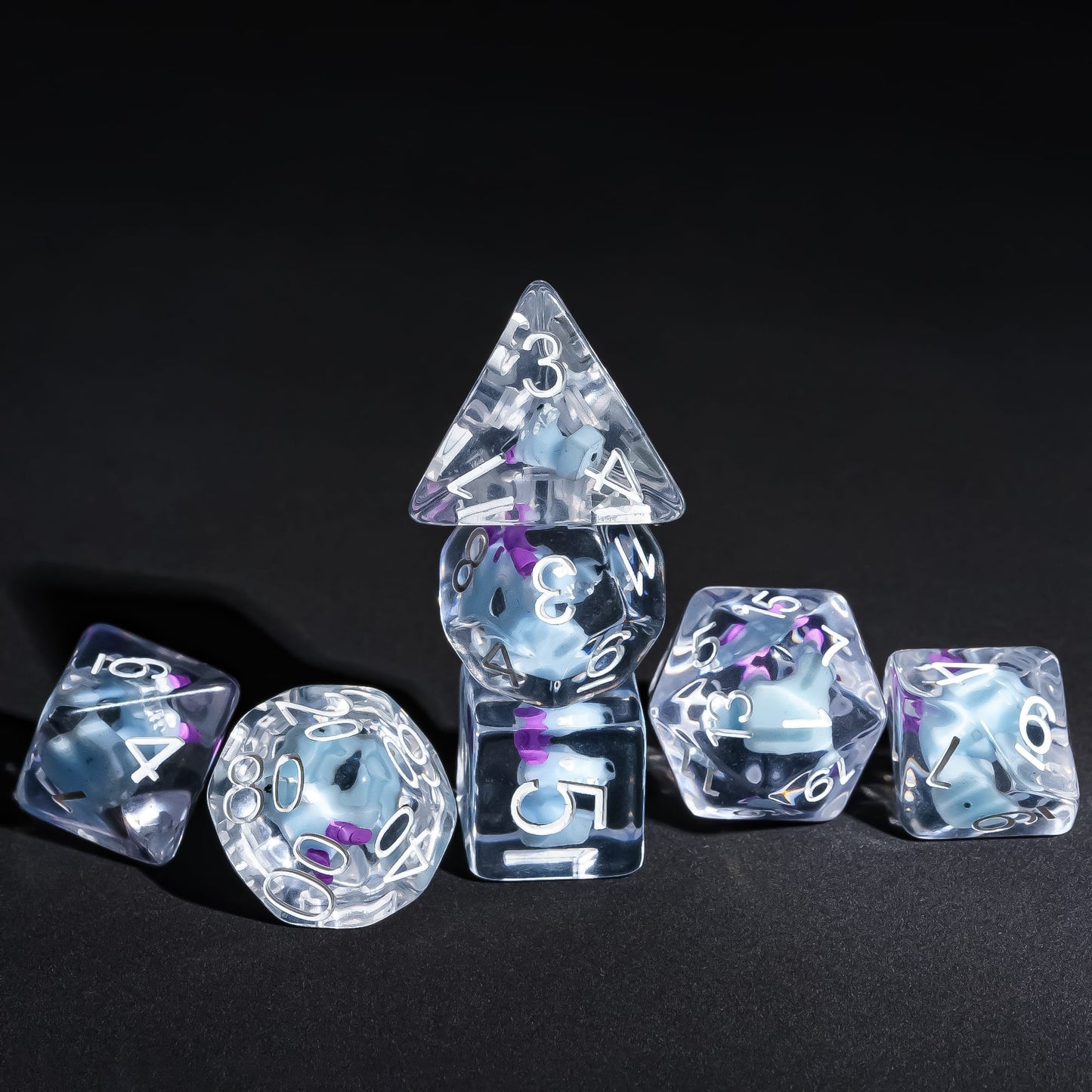 Kobold resin dice set stacked for tabletop display