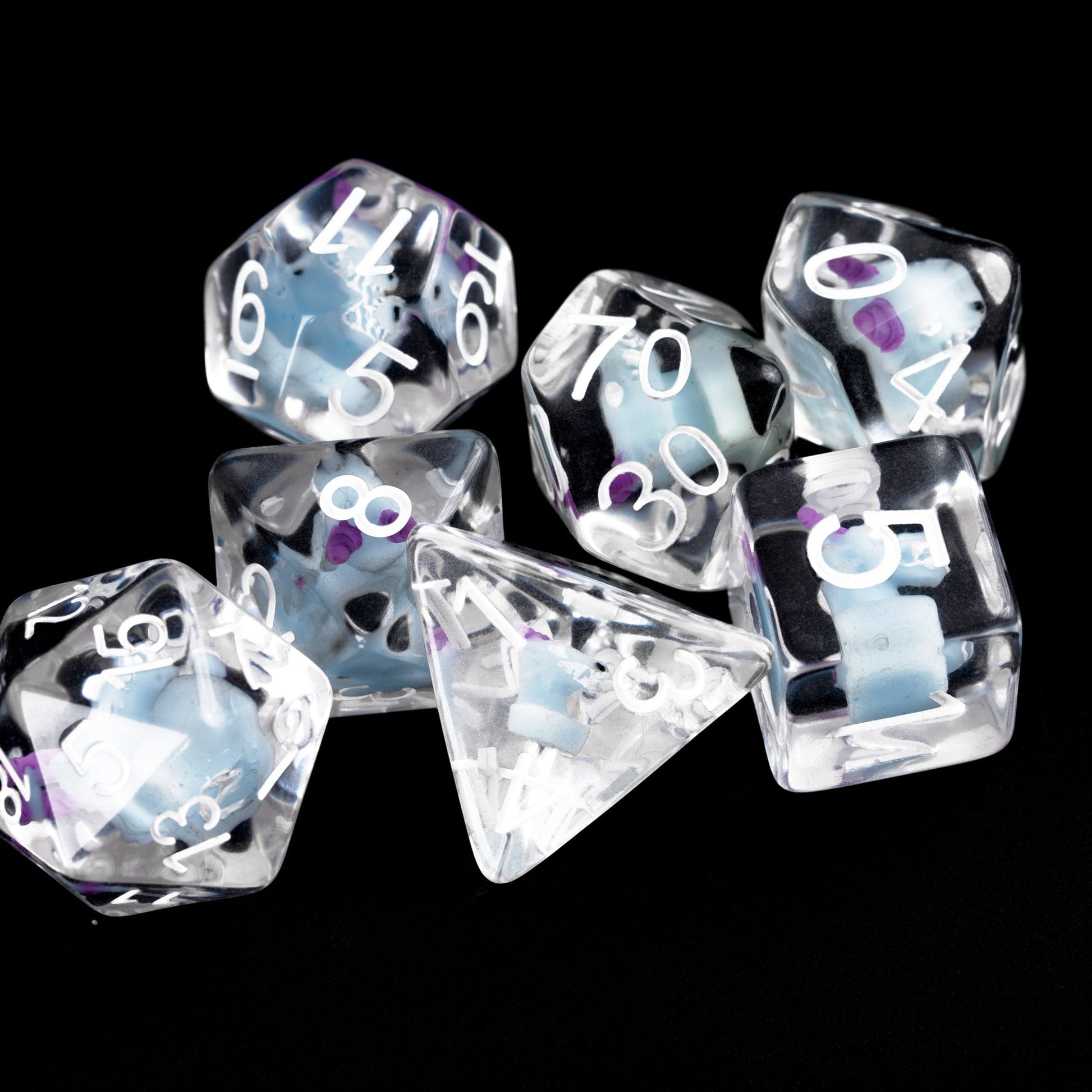 Clear resin kobold dice set with white numbering for DnD and tabletop RPGs