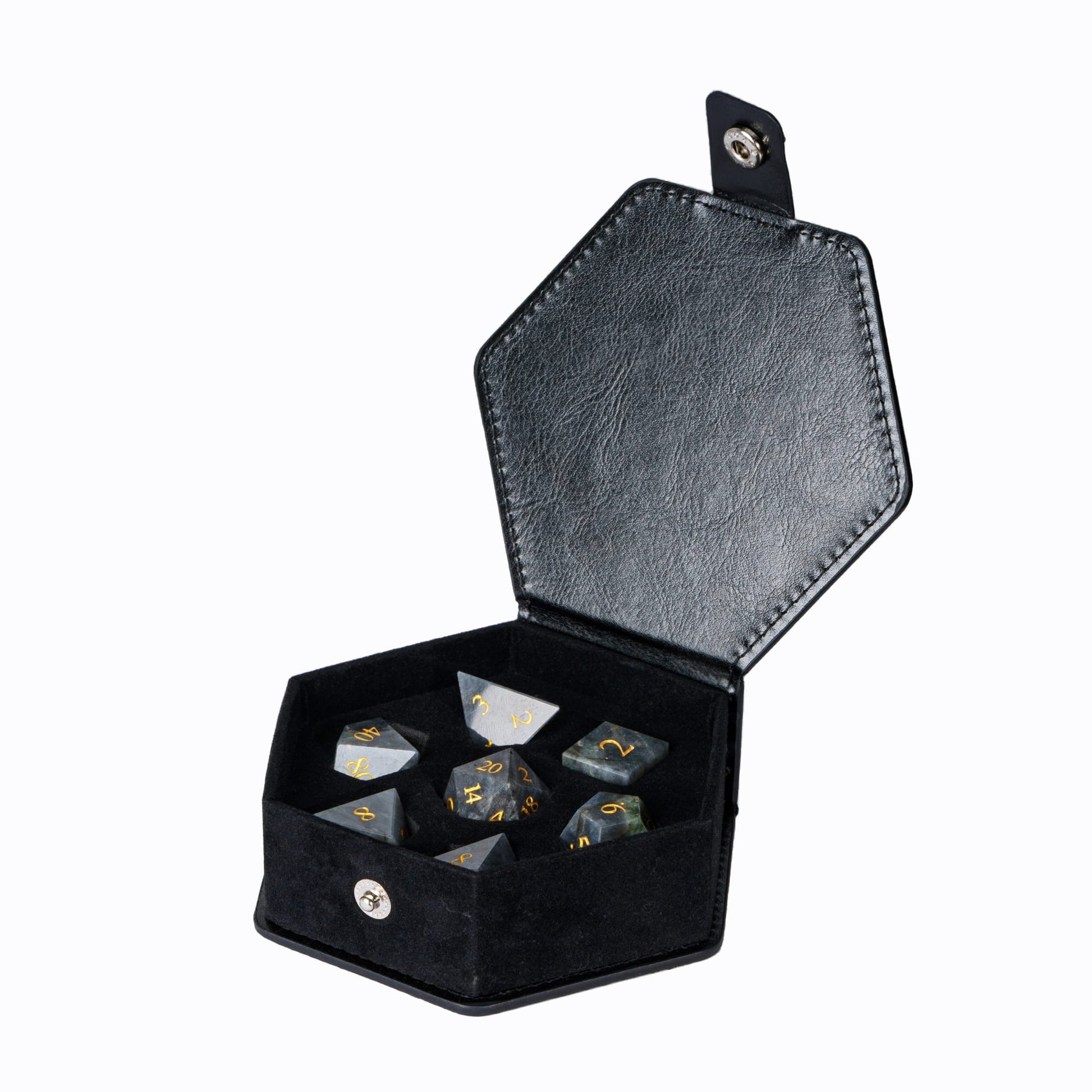 Labradorite Essence stone dice set displayed in a premium black storage case featuring genuine labradorite gemstone dice with gold numbering for tabletop RPGs