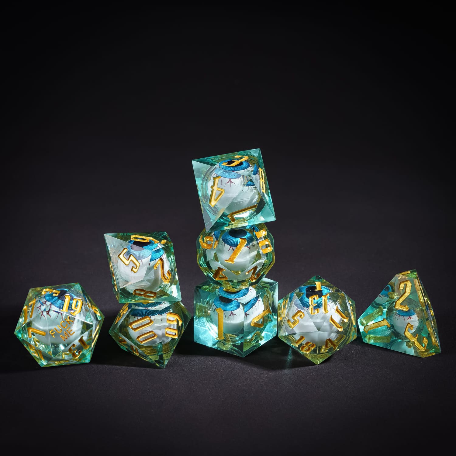 Stacked Liquid Core Eye Blue Sharp Edge Dice Set with gold numbering for DnD & tabletop games