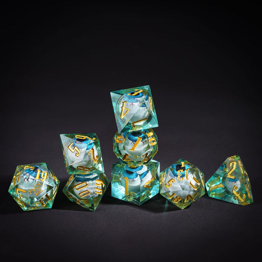 Stacked Liquid Core Eye Blue Sharp Edge Dice Set with gold numbering for DnD & tabletop games