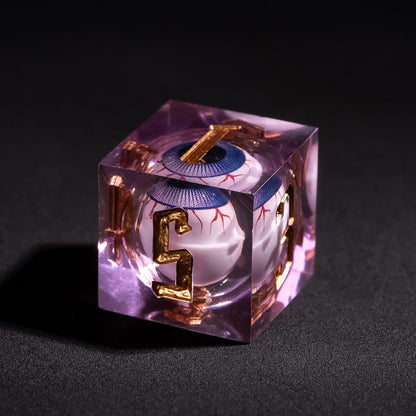 Close up of Liquid Core Eye Purple Sharp Edge D6 showing floating purple eye core inside translucent violet resin